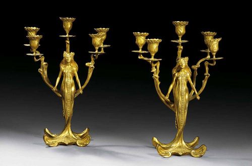 PAIR OF GILT BRONZE CANDELABRAS, ca. 1900. In the form of a woman in long dress. H. 43 cm.