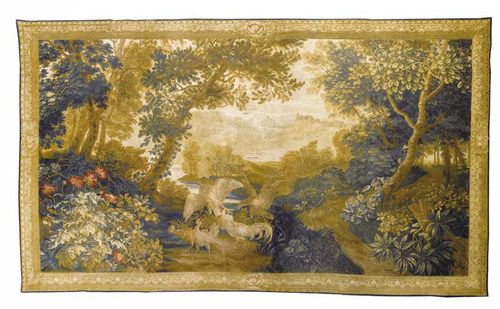 VERDURE TAPESTRY, Flemish circa 1700. Deer in idealised park landscape, with fine floral and foliate border.  H 250 cm, W 460 cm. Provenance: Private collection, Germany.