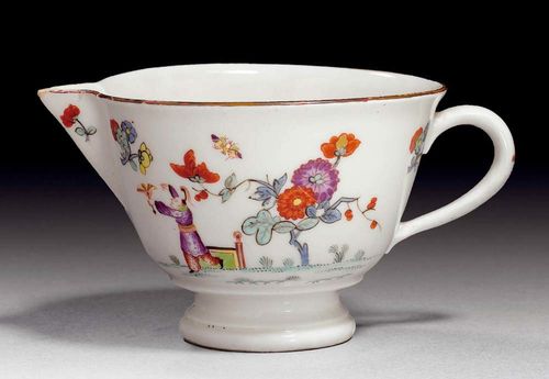 CUP WITH BEAK AND CHINOISERIE DECORATION, MEISSEN, CIRCA 1730.The decoration probably by Johann Ehrenfried Stadler. With landscapes on both sides, also chrysanthemums, flying phoenix and insects. Underglaze blue sword mark. Old restoration on the spout. Provenance: from an important private collection, Basel
