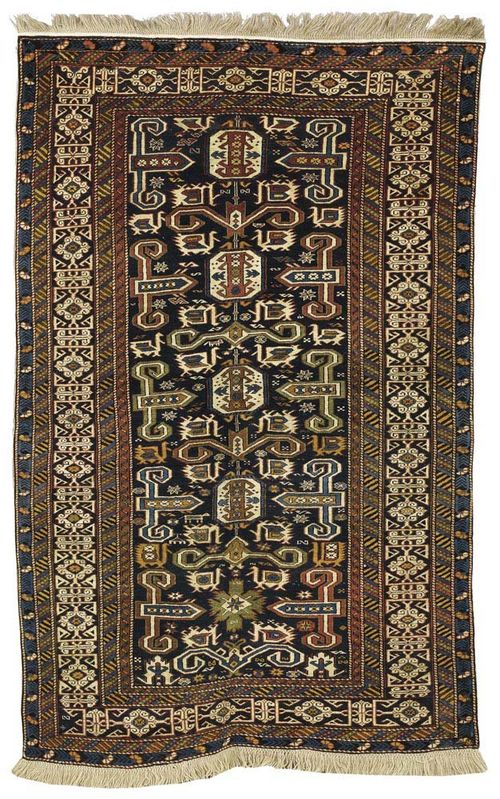 PEREPEDIL old. Black central field with typical rams head motifs in brown, white and blue. Light border. Good condition. 172x112 cm.