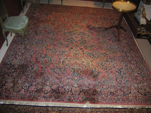 SAROUK old. Old rose ground with floral motifs in blue tones. Good condition.  350x270 cm.