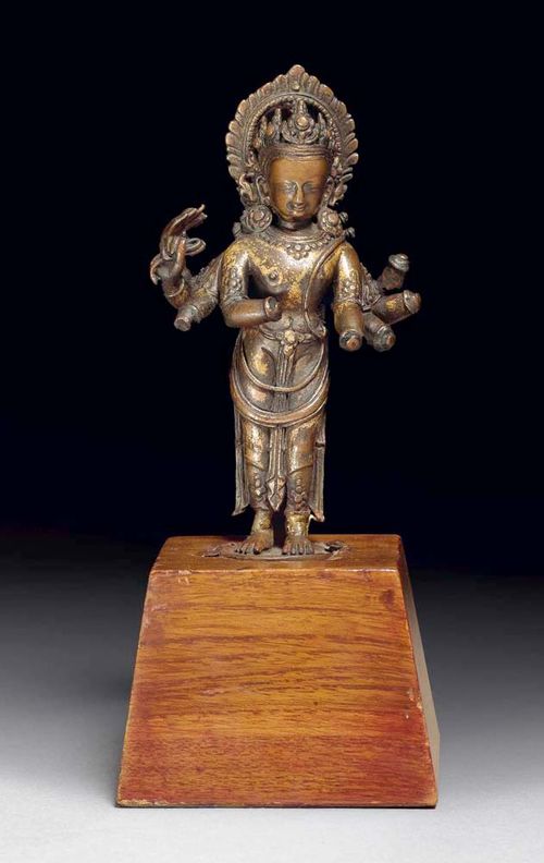 FIGURE OF AMOGAPASA. Copper alloy with remains of gilding. The face rubbed, with attractive lustre. Nepal, 17th century. . H 16 cm.