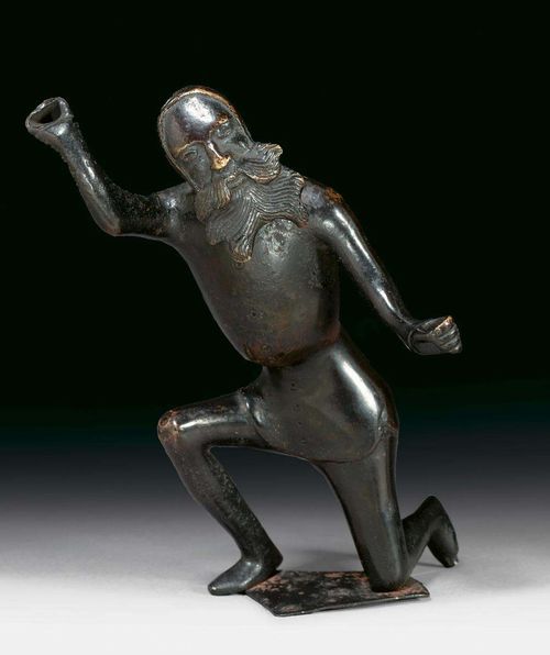 FIGURE OF A HUNTER, early Baroque, probably Nuremberg or Flanders, 15th/16th century. Cast yellow metal, burnished. H 26 cm. Provenance: from a very important European private collection. An important, rare figure of high quality.