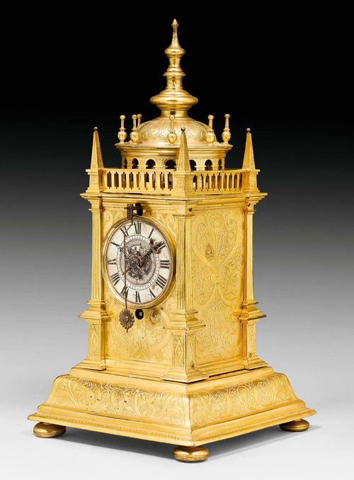 TURRET CLOCK WITH FRONT PENDULUM,late Renaissance, the case monogrammed NS (probably Nikolaus II Schmidt, 1582 until before 1637), Augsburg, 17th century. Matte and polished gilt bronze. Silver-plated bronze chapter ring. Verge escapement striking the hours on bell. Some alterations. Requires servicing. 14x14x28 cm.
