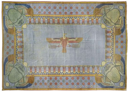 EUROPEAN CARPET, ca. 1930. Light blue ground decorated with an eagle motif, wide border in light blue with bulky scarabs in the corners in the Egyptian style, 380x560 cm.