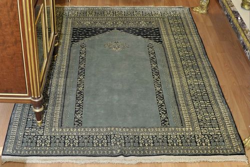 GHOM SILK PRAYER.Light blue mihrab with black spandrels, black edging with plant motifs, 130x190 cm.