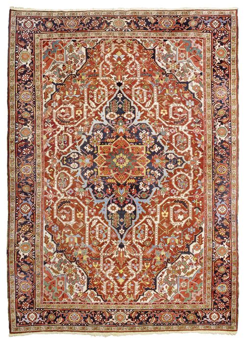 HERIZ antique.Red ground with a central medallion, typically patterned, black edging, signs of wear, 240x320 cm.