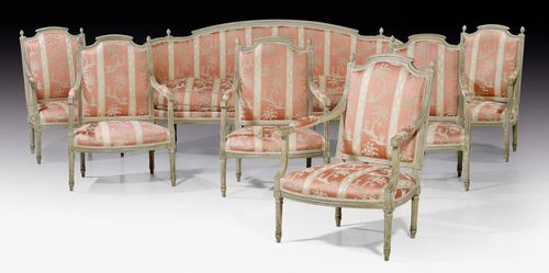 PAINTED SUITE OF FURNITURE,Louis XVI, in the style of P. PLUVINET (Philippe Joseph Pluvinet, maitre 1754), Paris circa 1780. Comprising: 1 three-seater canape "en corbeille" and 6 large fauteuils "a la reine". Fluted and finely carved walnut, painted grey. Red/beige striped satin cover, the canape with seat cushion. Canape 218x74x47x103 cm, Fauteuils 61x56x41x99 cm. Provenance: - Sotheby's Zurich Auction on 29.11.1995 (Lot No. 244). - From a highly important Swiss private collection.