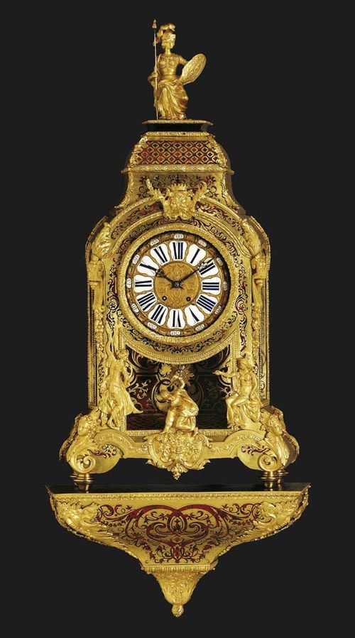 IMPORTANT BOULLE CLOCK WITH PLINTH, late Regence, Paris, 19th century. Red tortoiseshell, richly inlaid with brass fillets in "premiere-partie" and "contre-partie", and with scrolls, cartouches and decorative frieze. The bronze dial with 24 enamel plaques for the minutes in Arabic numerals and the hours in Roman numerals. Fine brass movement with anchor escapement striking the 1/2-hour on bell. Exquisite bronze mounts and applications. 60x28x146 cm. - The clock is in very good condition.