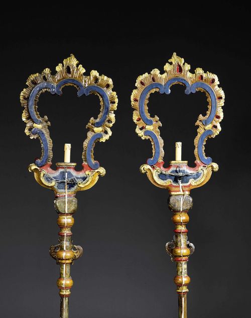 PAIR OF PAINTED LAMPS,Baroque, South German, 18th century. Shaped and polychrome painted wood. Fitted for electricity. H 200 cm.