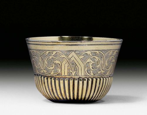 SILVER-GILT PALM CUP,Augsburg 1708.Maker's mark: Johann Christoph Huenning I (Henning). With strapwork decoration on a guilloche ground. H 4.6 cm.65 g.