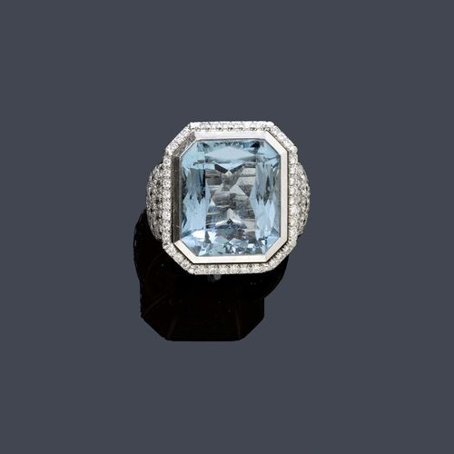 AQUAMARINE AND DIAMOND RING, MAJO FRUITHOF. White gold 750, 59g. Very fancy ring, the octagonal top set with 1 very fine aquamarine of ca. 33.00 ct, minimal signs of wear, the ring shoulders and the shank set throughout with numerous brilliant-cut diamonds weighing 9.10 ct. Size ca. 55, with size adjustment insert. With copy of invoice for the ring, December 2000.