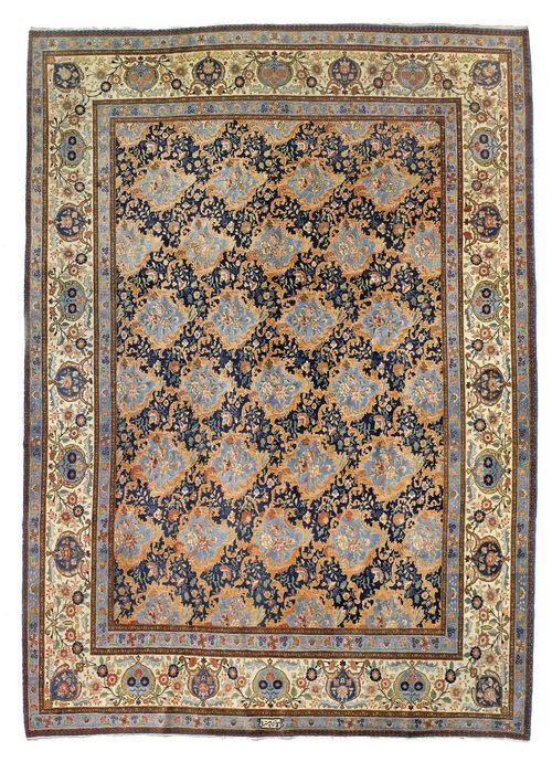 TABRIZ old.Dark blue central field patterned throughout with floral cartouches in light blue and pink, white edging with trailing flowers, 270x344 cm.