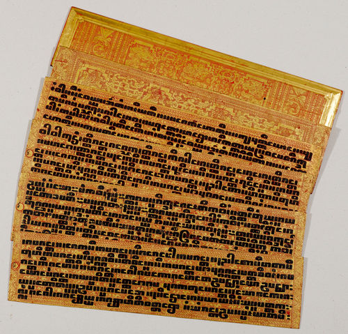 A RED LACQUER BUDDHIST BOOK (KAMMAVACA) WITH GOLD DECORATION.
