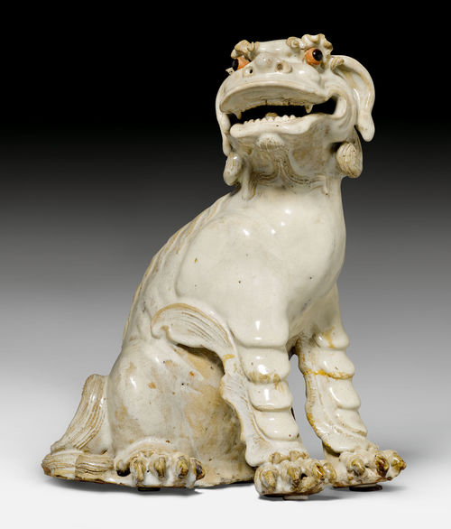 A LIVELY CERAMIC FIGURE OF A KOREAN LION-DOG (KOMAINU).