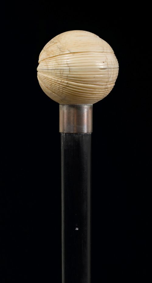 A WALKING STICK WITH HANDLE IN THE FORM OF A SHELL,