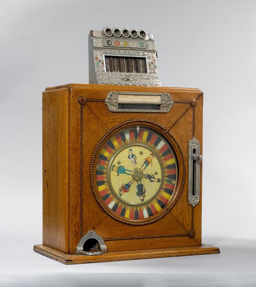 A MECHANICAL SLOT MACHINE "OUR BABY",