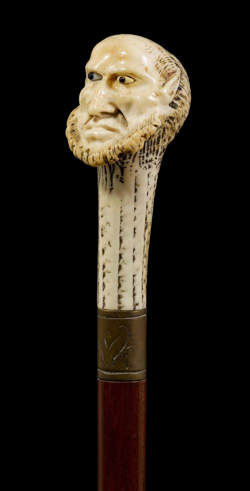 A WALKING STICK WITH STAG ANTLER KNOB,