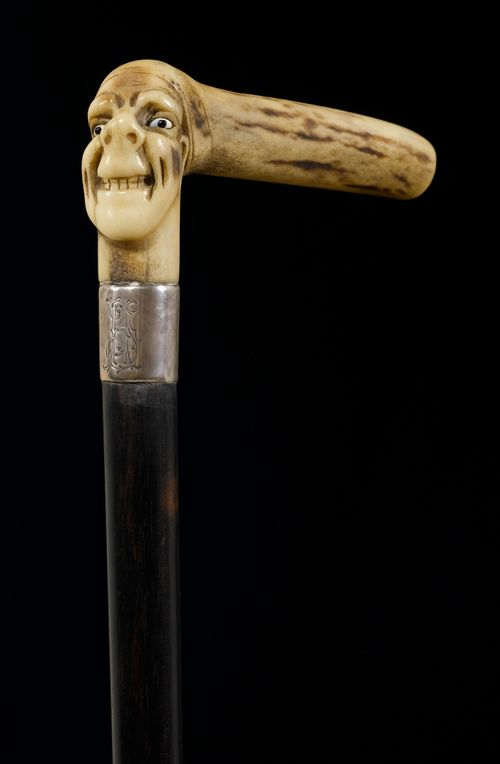 A WALKING STICK WITH STAGHORN HANDLE,