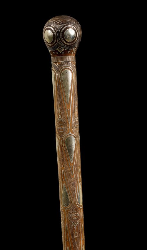 A WALKING STICK WITH SPHERICAL KNOB,