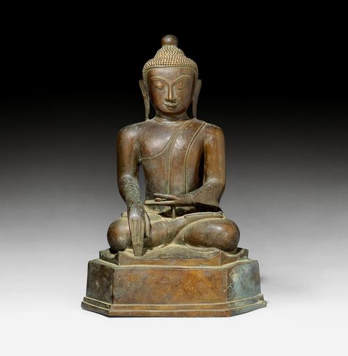 A BRONZE FIGURE OF THE SEATED BUDDHA SHAKYAMUNI.