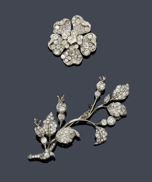 DIAMOND BROOCHES, ca. 1880. Silver over pink gold. Decorative brooch designed as a rose, set with 1 oval diamond weighing ca. 0.55 ct and set throughout with 74 old European-cut diamonds weighing ca. 5.00 ct, mechanical part is removable, can be mounted on a longer brooch designed as a rose branch, the leaves and buds set with diamonds weighing ca. 3.20 ct. L ca. 8.5 cm. Original case signed Collingwood Jewellers Ltd, 46 Conduit St. W.