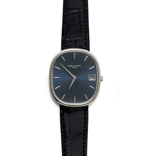 GENTLEMAN'S WRISTWATCH, AUTOMATIC, PATEK PHILIPPE, "JUMBO" ELLIPSE, 1970s. White gold 750. Ref. 3605. Oval case No. 2766193. Blue dial with silver-coloured indices and hands, date at 3h, no second hand. Automatic, movement No. 1304901, Cal. 28-255C with Gyromax balance and gold rotor. Black, original leather band with Patek gold clasp. D 38 x 33 mm. With case.