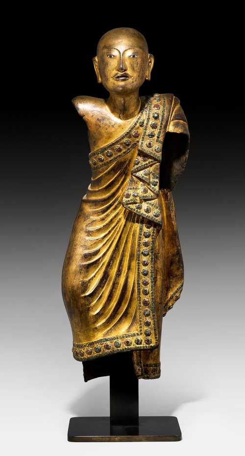 A GILT DRY LACQUER FIGURE OF A MONK.