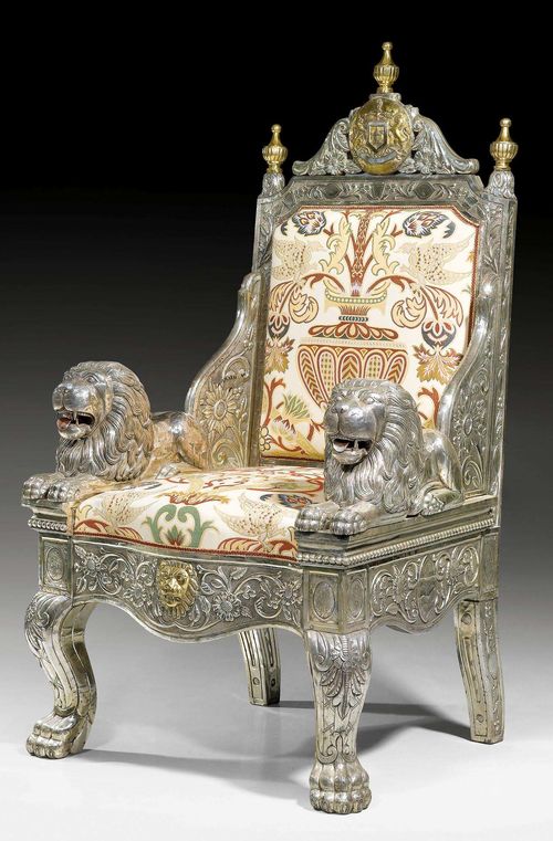 IMPORTANT FAUTEUIL "AUX LIONS",Napoleon III, probably Rajasthan (India) circa 1870/80. Wood and silver, parcel gilt. Polychrome fabric cover. 65x60x68x105 cm.