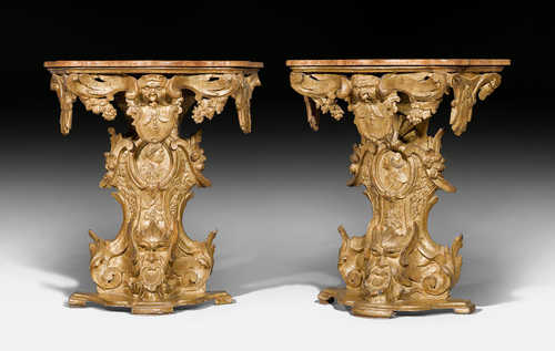 PAIR OF SMALL CONSOLES "AUX MASCARONS",