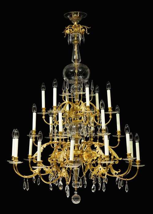 IMPORTANT CHANDELIER,Revival Style, by J. LOBMEYR (Joseph Lobmeyr, 1792-1855), Vienna circa 1880. Gilt bronze and brass with partly cut glass. Fitted for electricity. W 90 cm, H 160 cm.