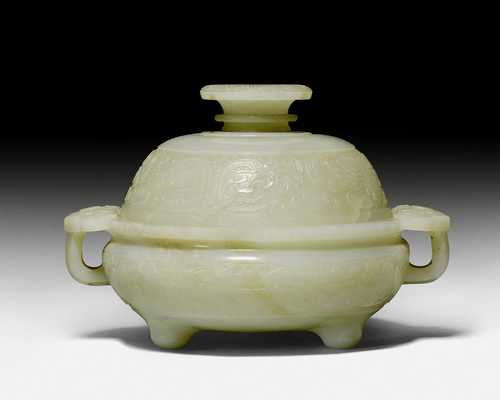 A PALE CELADON AND CREAM JADE CENSER AND COVER.