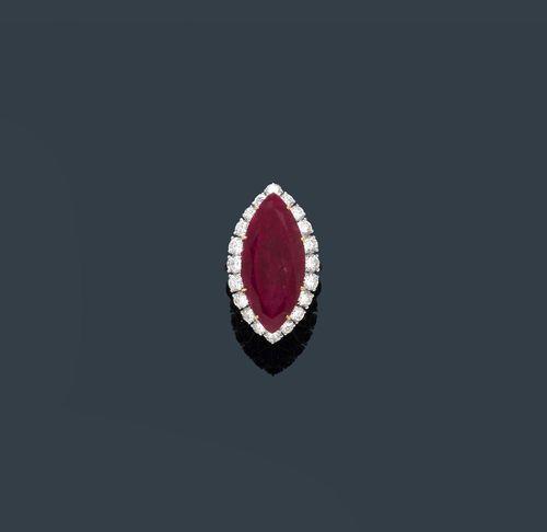 RUBY AND DIAMOND RING, France, ca. 1960. Platinum and white gold 750. Fancy, elegant ring. The top set with 1 navette-cut ruby weighing ca. 27.00 ct, unheated, within a border of 20 brilliant-cut diamonds weighing ca. 3.20 ct. Size ca. 53, with size adjustment insert. With case and GGTL Short Report No. 14-B-2473.
