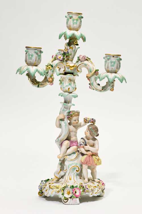 A PORCELAIN CANDELABRUM WITH FIGURES OF CHILDREN AS AN ALLEGORY OF SUMMER,
