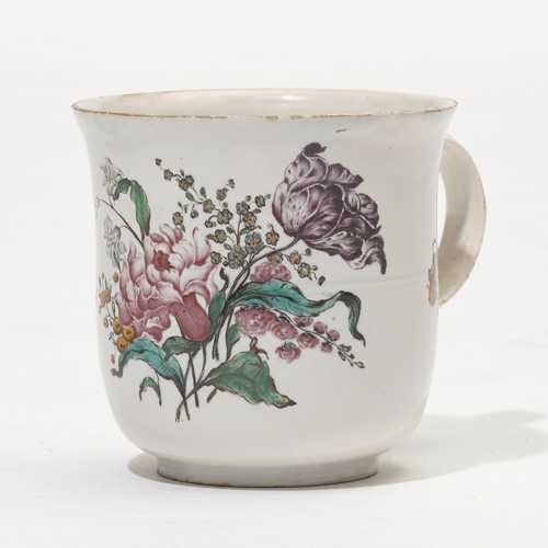 A FAIENCE CUP WITH FLOWER BOUQUETS,