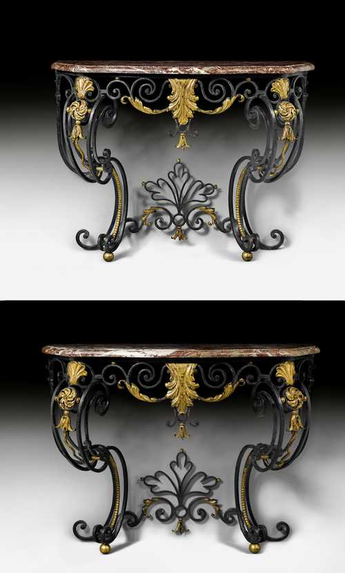 PAIR OF IRON CONSOLES "AUX CARTOUCHES",