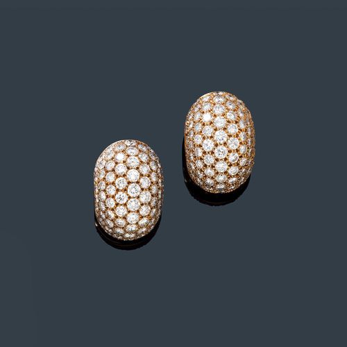 DIAMOND EAR CLIPS, VAN CLEEF & ARPELS. Yellow gold 750. Decorative, convex ear clips with studs, each set throughout with 76 brilliant-cut diamonds, weighing ca. 11.00 ct in total. Signed Van Cleef & Arpels, No. 143545.