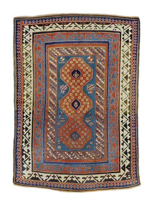 BORDJALU antique.Narrow central field in green and red, geometrically patterned, wide edging with stylized trailing flowers, restored, with signs of wear, 155x215 cm.