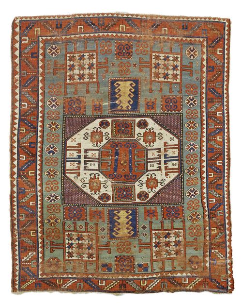KARATCHOPH antique.Green central field with a bulky central medallion, geometrically patterned, red edging, strong signs of wear, 190x220 cm.