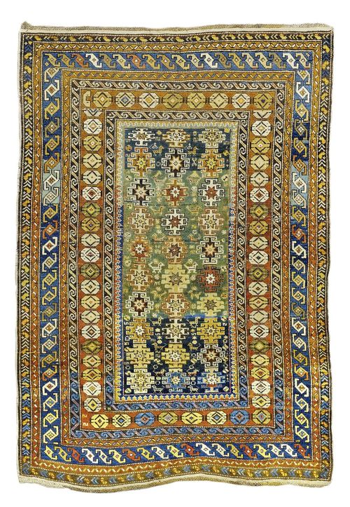 TSHI TSHI antique.Central field in blue and green with star motifs, wide border, signs of wear, 114x158 cm.