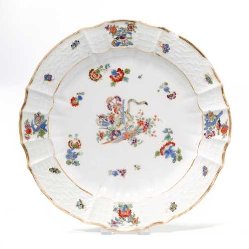 2 PLATES WITH EAST ASIAN DECORATION "YELLOW LION",