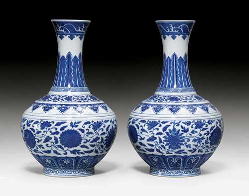 A PAIR OF BLUE  AND WHITE BALUSTER VASES WITH FLOWER DESIGN. China, underglaze blue Guangxu six character mark and of the period, height 39 cm. (2)