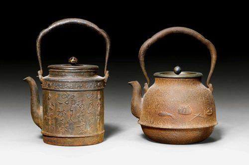 TWO SIGNED IRON TESTUBIN WITH BRONZE COVERS. Japan, 19th c. Height 23 and 21 cm. Both a bit rusty.