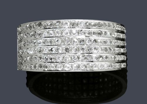 DIAMOND BANGLE. White gold 750, 85g. Modern, broad, elegant bangle with hinge, set throughout with a total of ca. 384 rose-cut diamonds weighing ca. 8.00 ct, arranged in 6 rows. W ca. 3 cm, ca. 6.3 x 5.3 cm.
