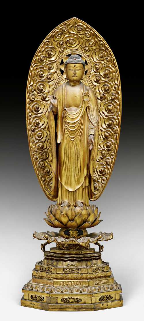 A GOLD LACQUERED WOOD FIGURE OF THE STANDING AMIDA NYORAI.
