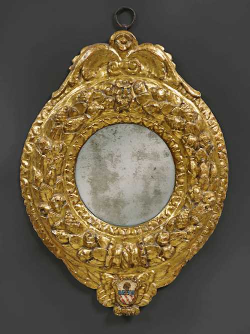 CARVED AND GILT FRAME AS A MIRROR,