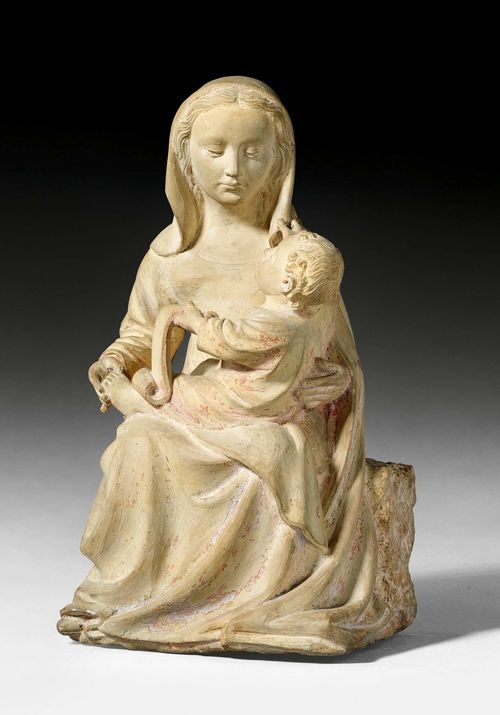 ENTHRONED VIRGIN AND CHILD,Gothic, Burgundy circa 1420/30. Limestone carved full round with remains of paint and gilding. H 41 cm. Head of the Madonna repaired.
