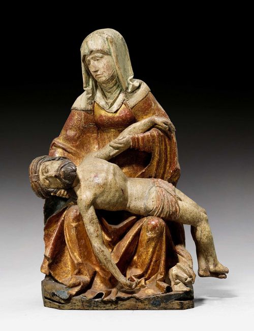 PIETA,late Gothic, Bavaria circa 1510. Wood carved full round and painted. Various paint layers. Repairs and substitutions to the hands and feet of Christ, the plinth area with various substitutions. H 60 cm.