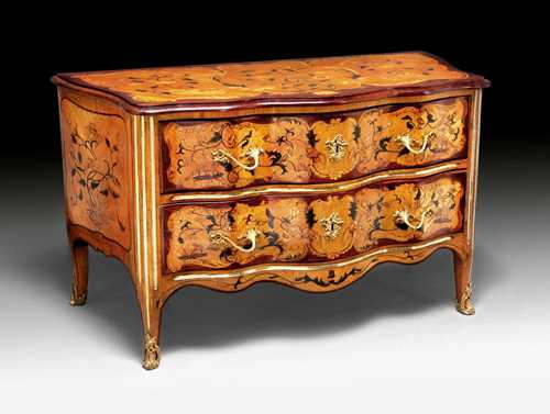 IMPORTANT COMMODE "A FLEURS",Louis XV, in the manner of J.F. HACHE (Jean François Hache, 1730 Grenoble 1796), France circa 1755/65. Rosewood, mahogany, amaranth, maple, boxwood, lemonwood and partly dyed precious woods in veneer with exceptionally fine inlays on all sides. With brass fluting. "En arbalete" front with 2 drawers. Exceptionally fine, matte and polished gilt bronze mounts and sabots. 143x69x83.5 cm.