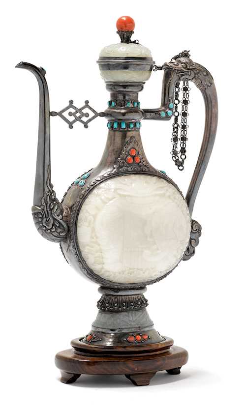 A FINE SILVER EWER WITH JADE MEDAILLONS.